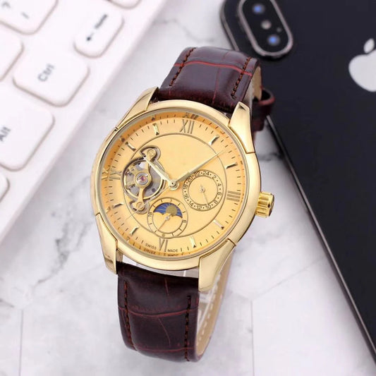 Elegant mechanical watch with a leather strap and stainless steel horseshoe buckle.