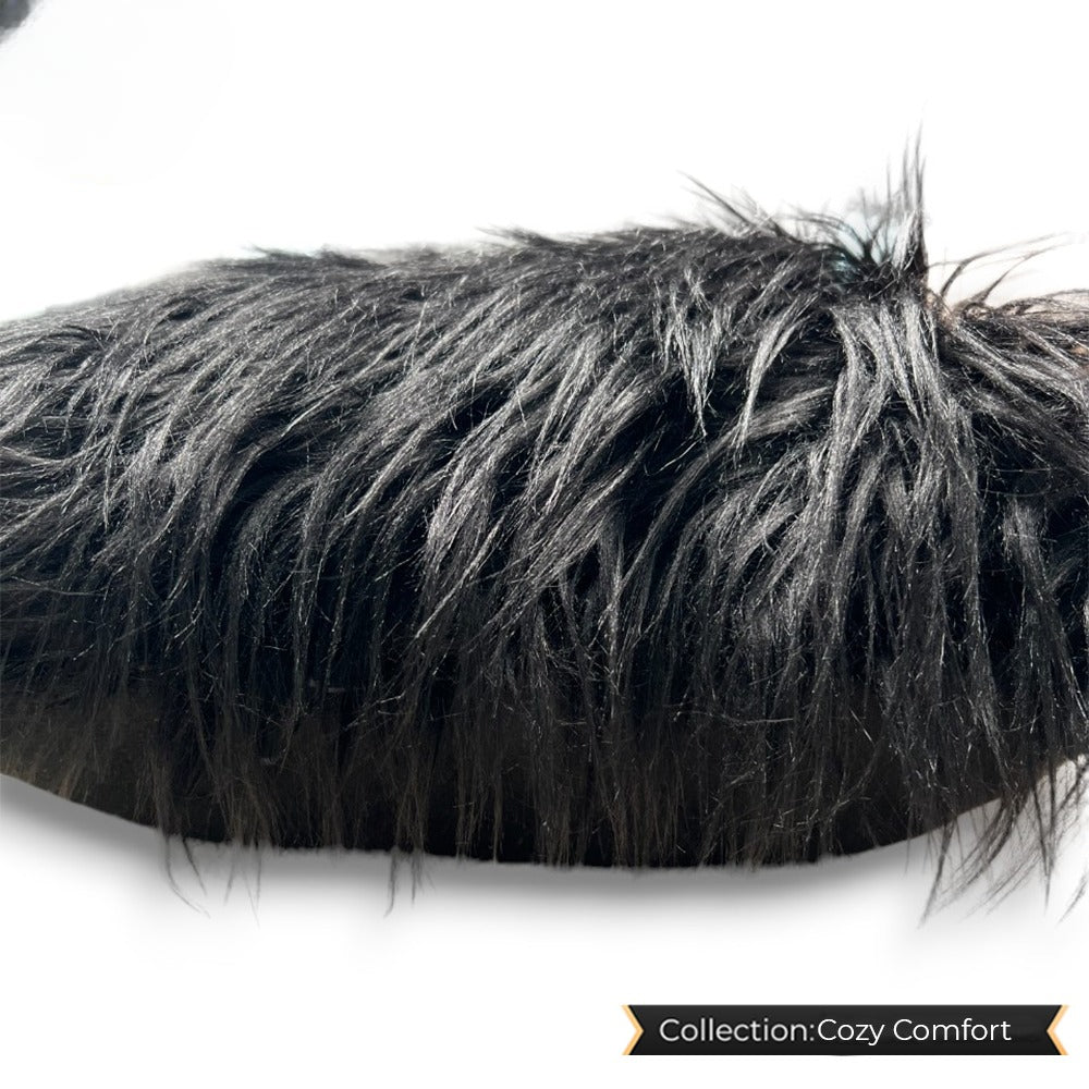 Black fuzzy cushion, soft and plush, ideal for cozy home decor.